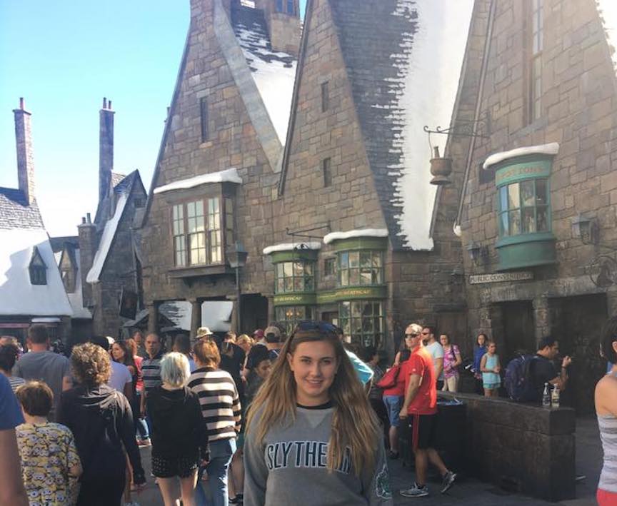 This is me at Harry Potter World and Harry Potter World makes me very happy. 