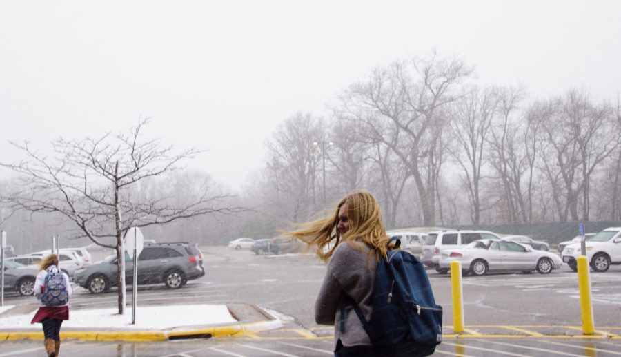 Chilly April Montgomery, 17, walks to her car in the frigid December temperature. Put on a coat, April!