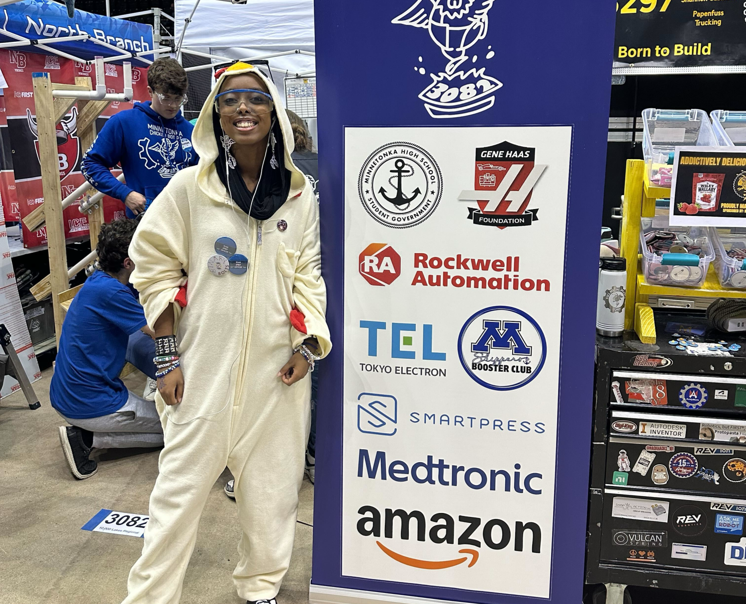 Aishah Adam '26 pictured in the Minnetonka Robotics Team, Chicken Bot Pie, mascot uniform. Unlike past years when other team members were approached about taking on the role of the mascot Aishah jumped at the chance, "I am just that person who is always high energy and positive." Aishah often partakes in a variety of uplifting roles throughout her activities,“If it sounds hilarious ill do it."
